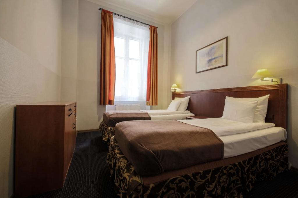 Posteľ alebo postele v izbe v ubytovaní Red Carpet Hostel