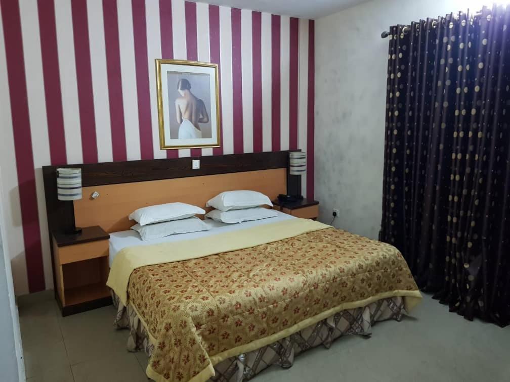 Postel nebo postele na pokoji v ubytování Citilodge Hotel