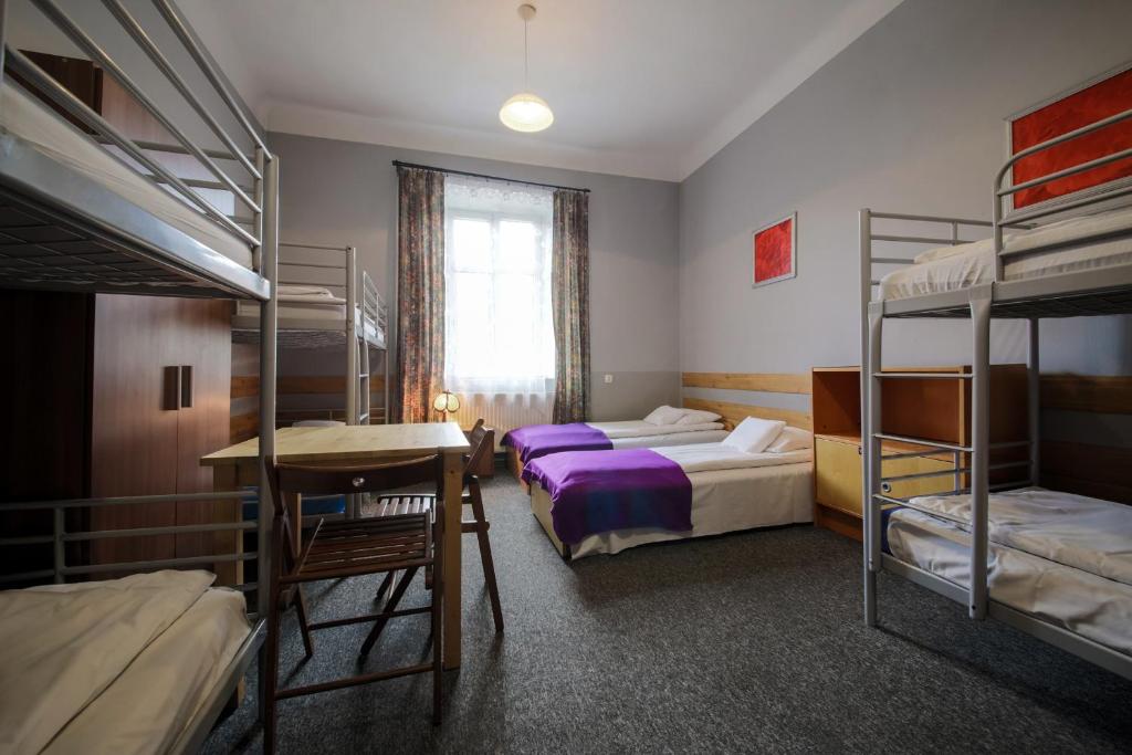 Posteľ alebo postele v izbe v ubytovaní Red Carpet Hostel