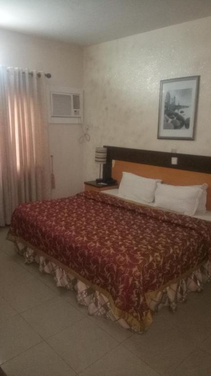 Postel nebo postele na pokoji v ubytování Citilodge Hotel