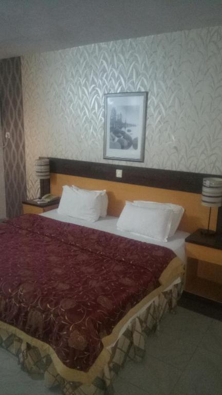 Postel nebo postele na pokoji v ubytování Citilodge Hotel
