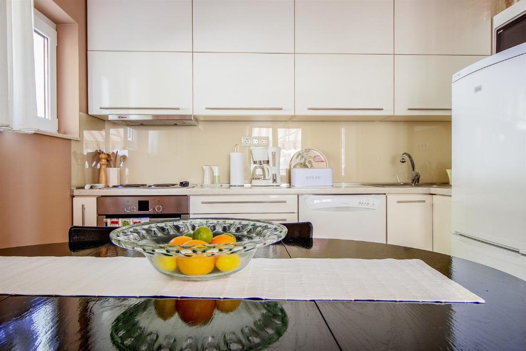 Kuchyň nebo kuchyňský kout v ubytování Apartment Mirela