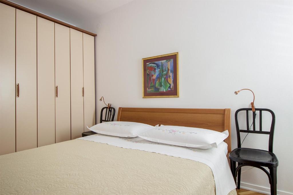 Postel nebo postele na pokoji v ubytování Apartment Mirela