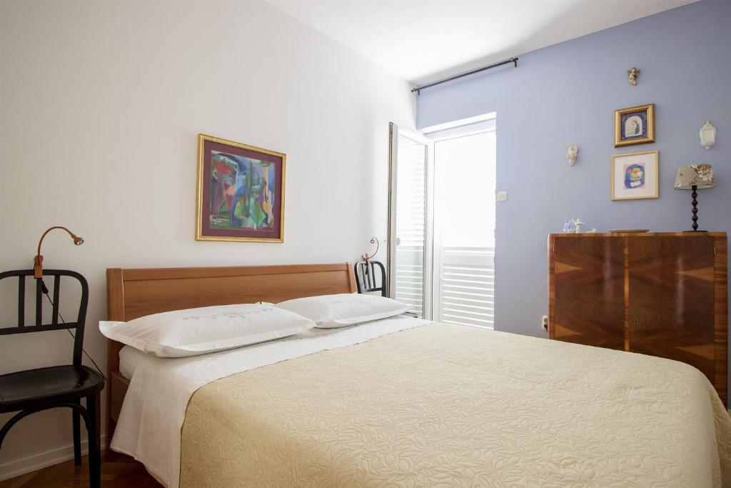 Postel nebo postele na pokoji v ubytování Apartment Mirela