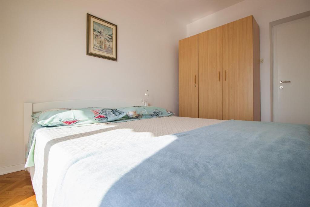 Postel nebo postele na pokoji v ubytování Apartment Mirela