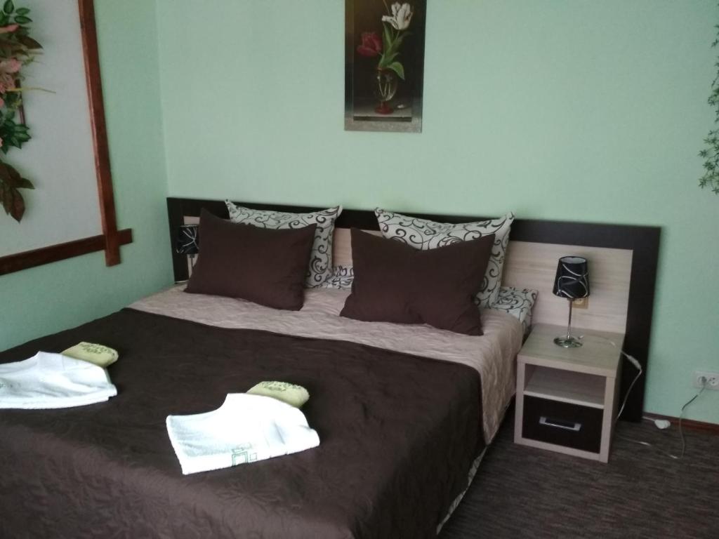 Postel nebo postele na pokoji v ubytování U dida Grytsya