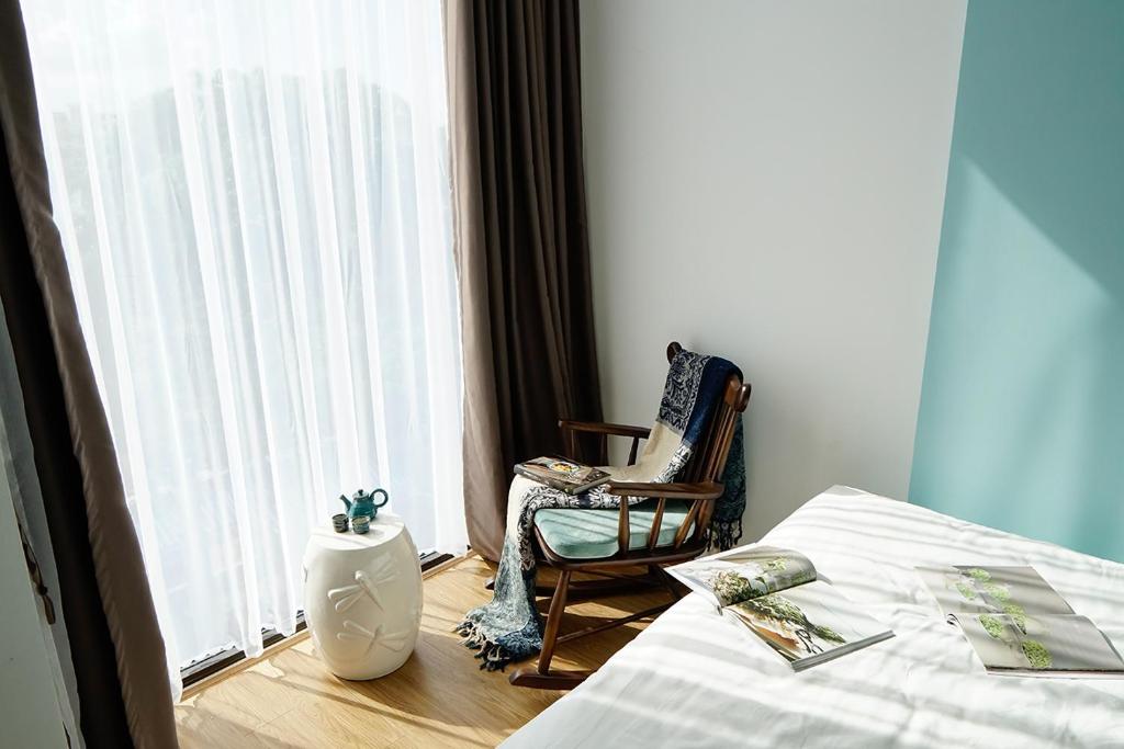 Postel nebo postele na pokoji v ubytování Phuong Tran Apartment and Hotel