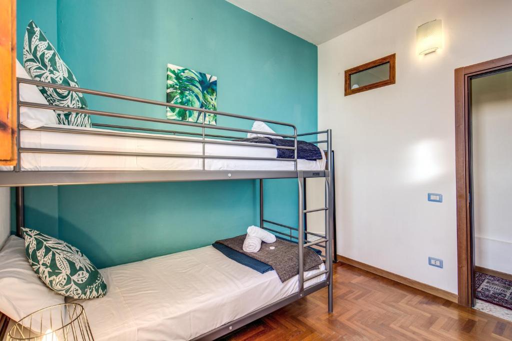 Posteľ alebo postele v izbe v ubytovaní AwesHomeItaly - Lungarno Bellavista Penthouse