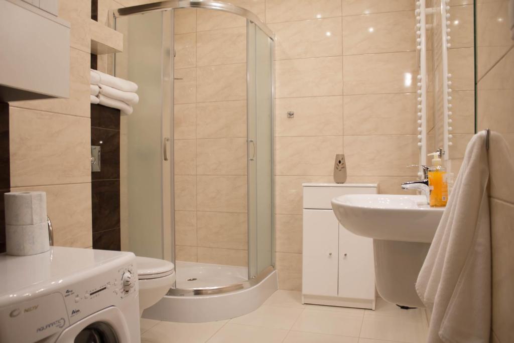 Kúpeľňa v ubytovaní Apartament Perłowy z balkonem- Dream Apart