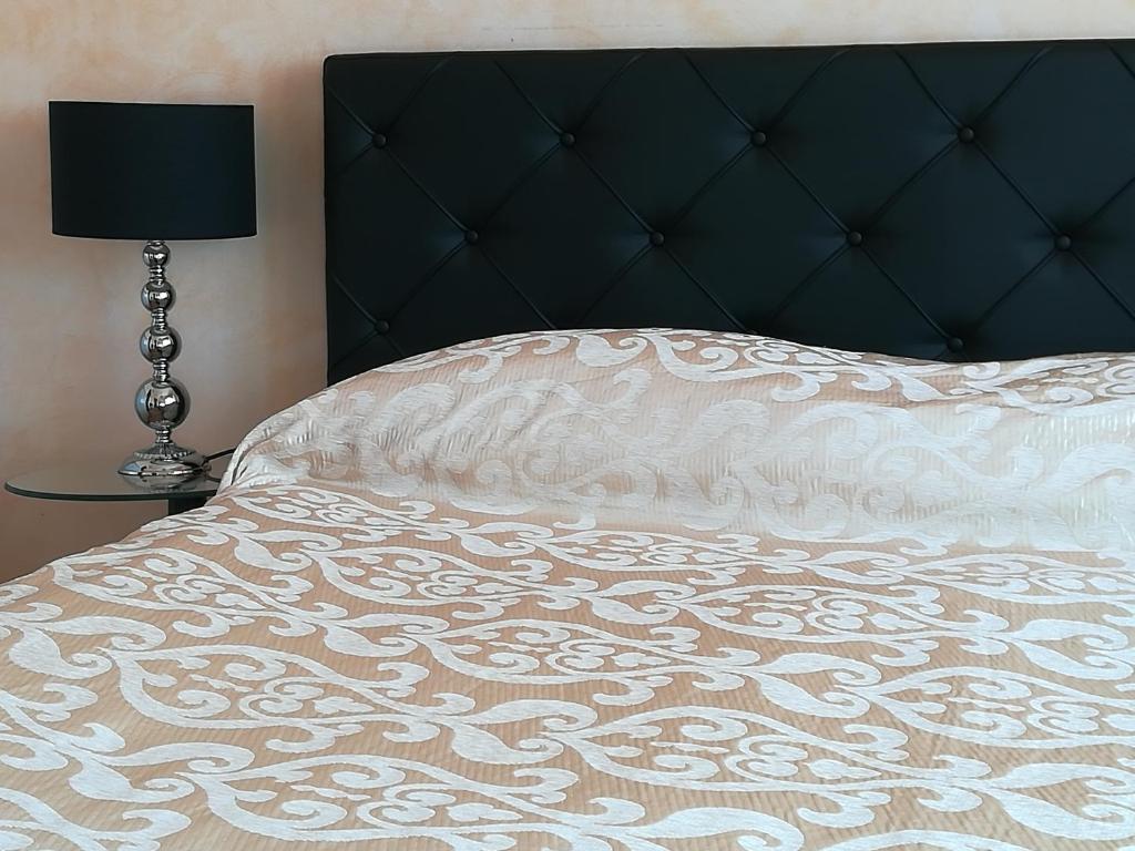 Postel nebo postele na pokoji v ubytování B&B La Casa Di El