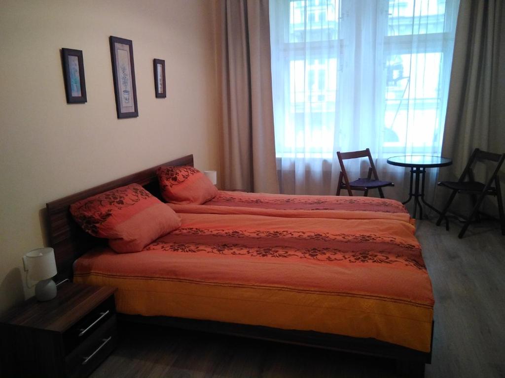 Postel nebo postele na pokoji v ubytování U Andela