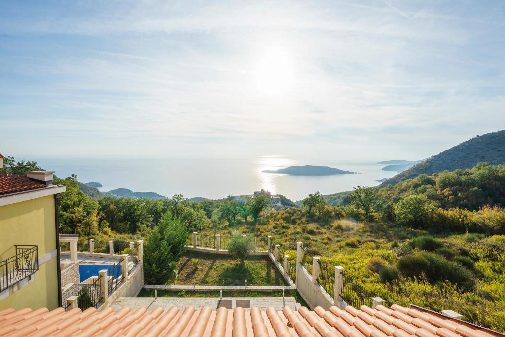 a villa with a view of the ocean at Sunbreeze Delux Vilas in Budva