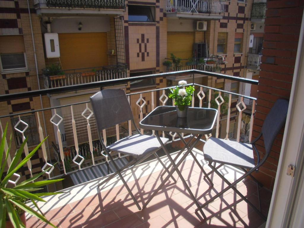 A balcony or terrace at Lovely Little Apartment in Via Aurelia