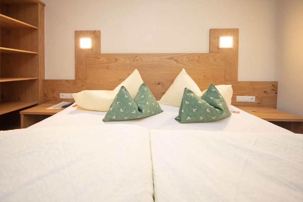 Postel nebo postele na pokoji v ubytování Hotel Appart Peter