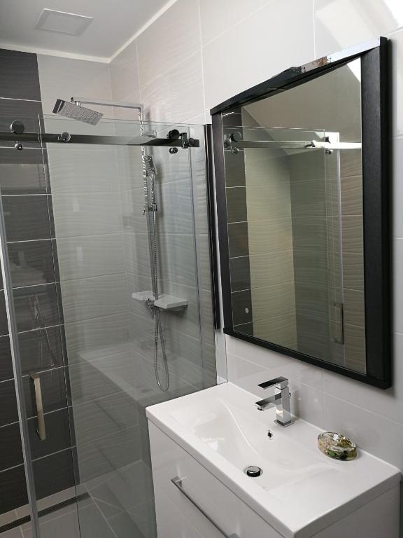 Koupelna v ubytování AQUA SOLAR APARTMANHÁZ