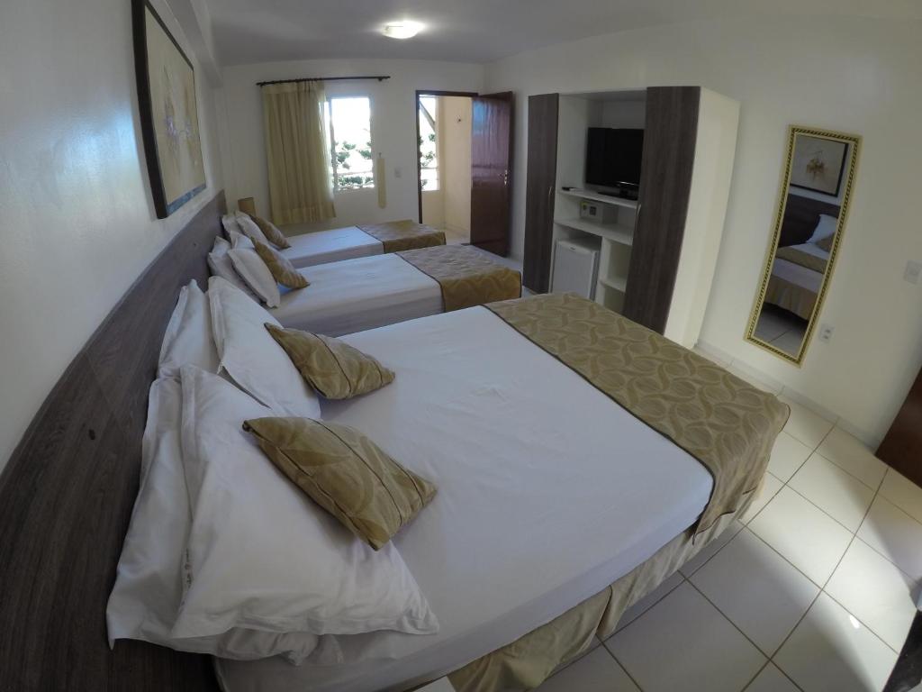 Krevet ili kreveti u jedinici u okviru objekta Pousada Porto das Dunas