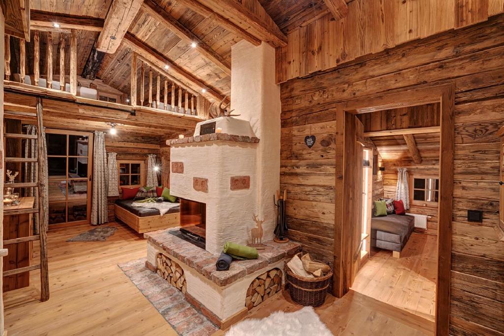 Posezení v ubytování Highking Chalet Grünegg