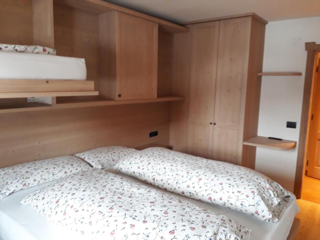 Postel nebo postele na pokoji v ubytování Chalet Del Sole per gruppi