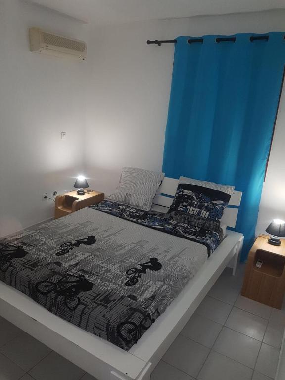 Postel nebo postele na pokoji v ubytování CHIRIJIEN BLÉ