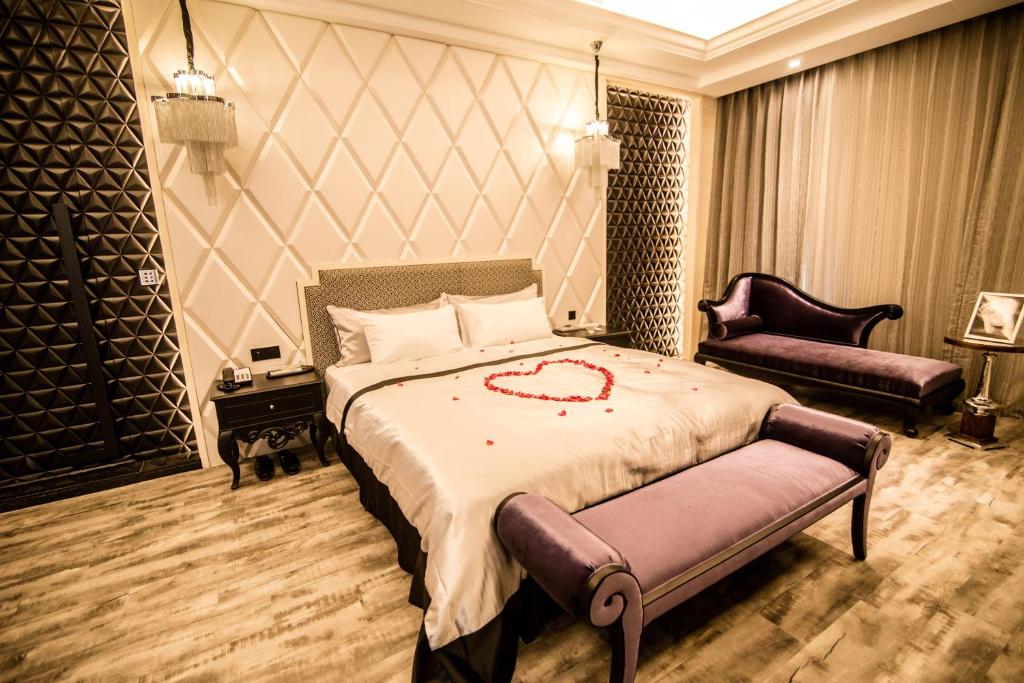 Postel nebo postele na pokoji v ubytování Kumotsuki Motel