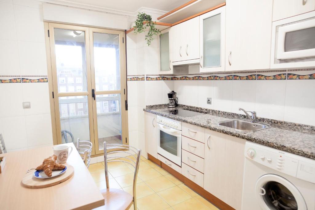 Kuchyň nebo kuchyňský kout v ubytování Housingleón - Conde Duplex con garaje gratuito