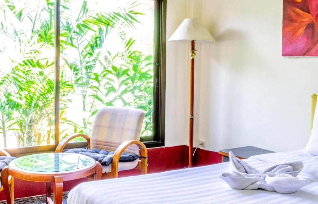 Postel nebo postele na pokoji v ubytování Kata Leaf Resort Phuket -