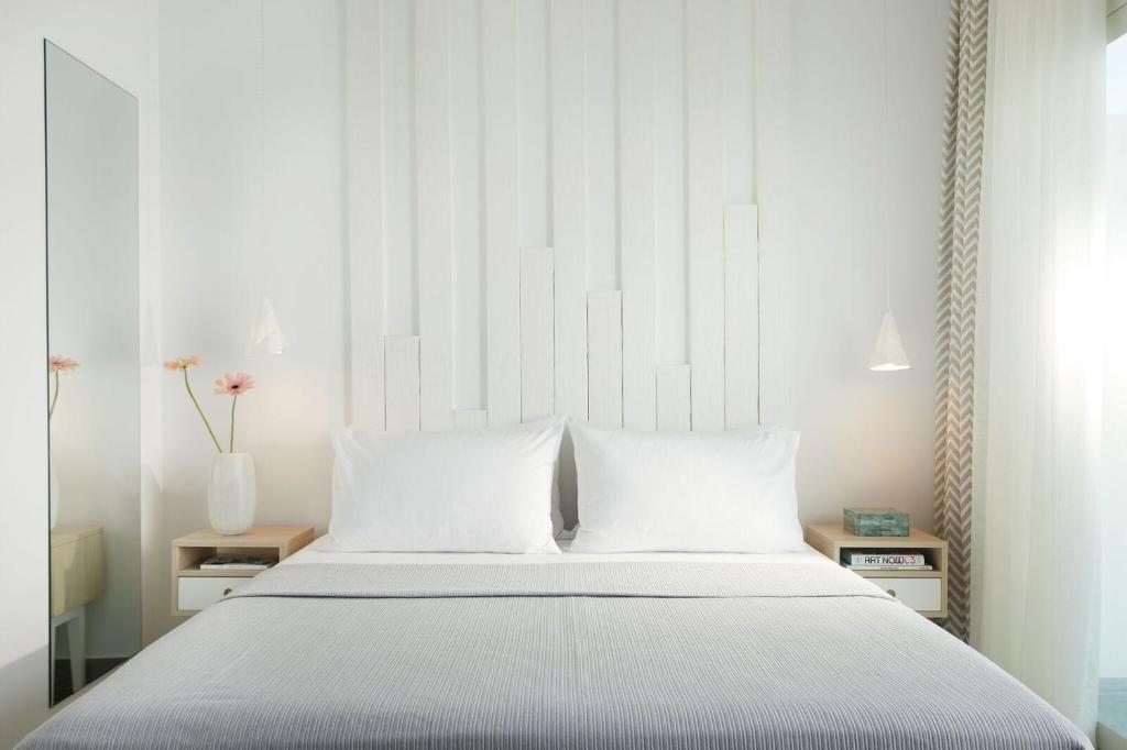 Postel nebo postele na pokoji v ubytování Hotel Alkyonis