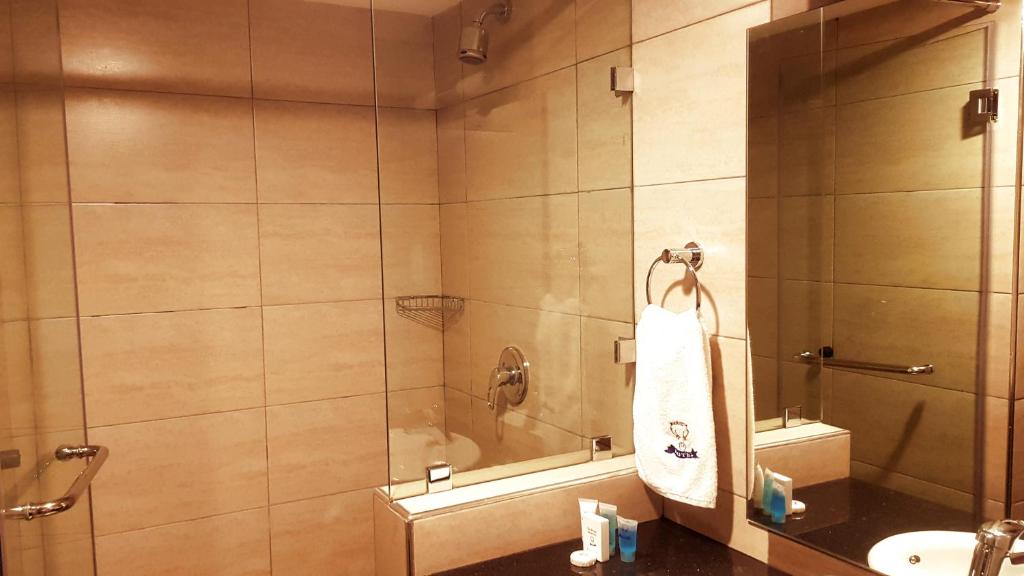 Koupelna v ubytování Merica Hotel
