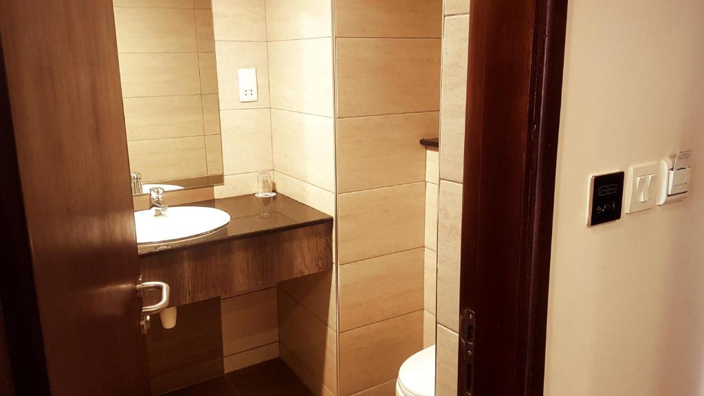 Koupelna v ubytování Merica Hotel