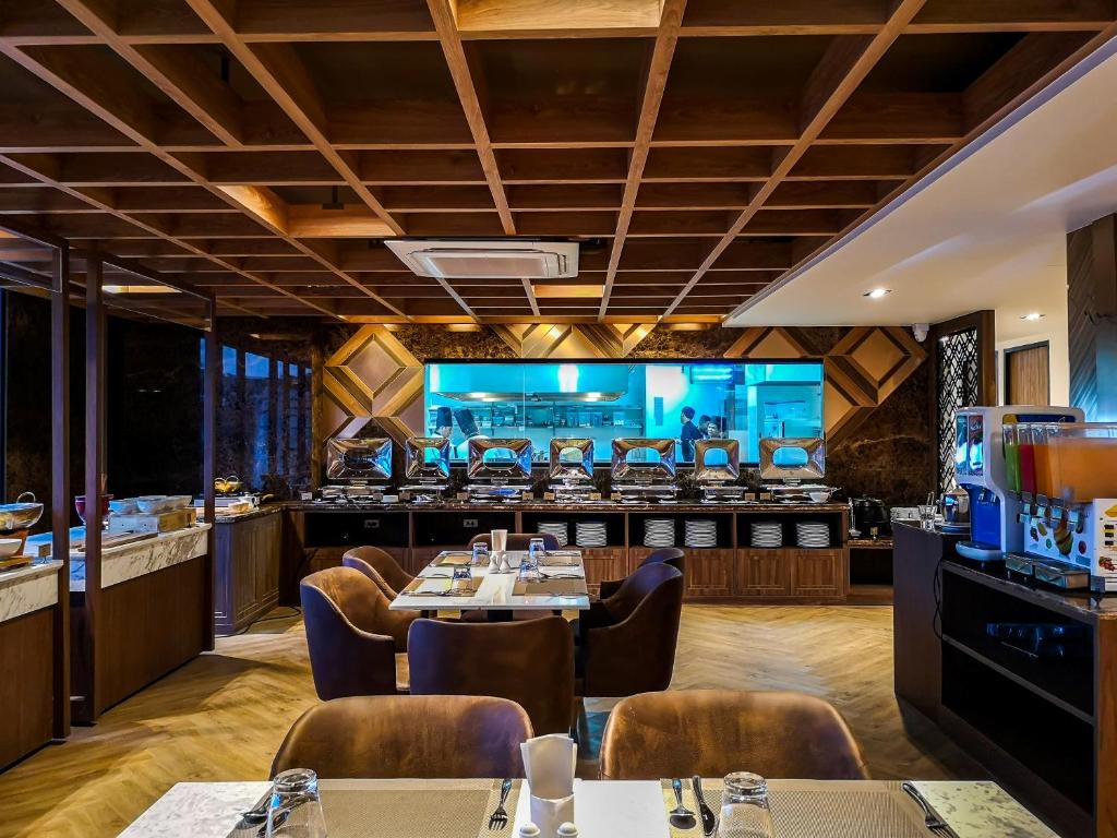 ห้องอาหารหรือที่รับประทานอาหารของ Zayn Hotel Bangkok - SHA Plus Certified