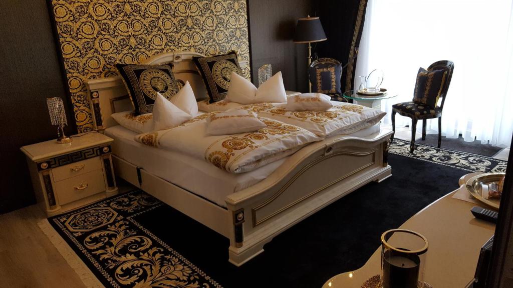 Postel nebo postele na pokoji v ubytování Hotel Forsthaus