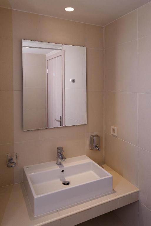 Koupelna v ubytování Poseidon Studios & Apartments
