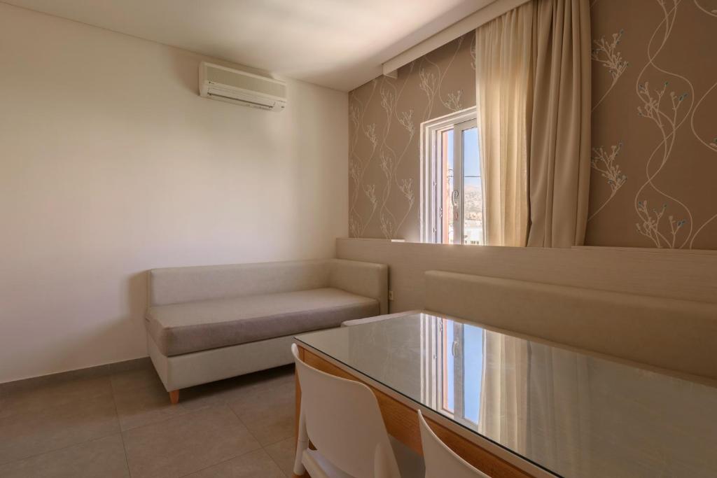 Posezení v ubytování Poseidon Studios & Apartments