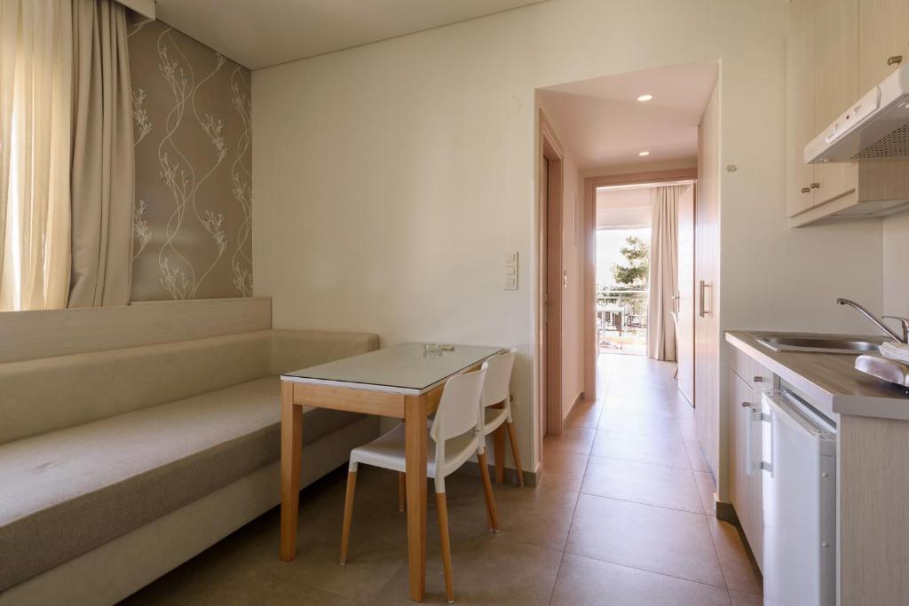 Kuchyň nebo kuchyňský kout v ubytování Poseidon Studios & Apartments