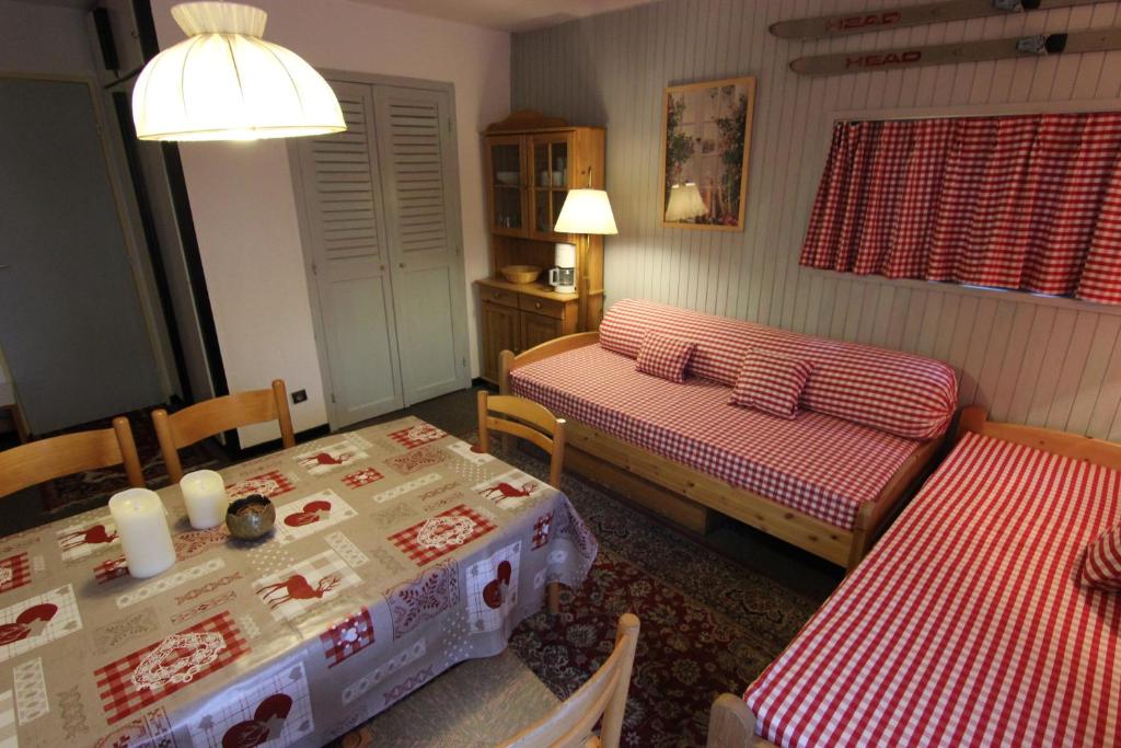 Postel nebo postele na pokoji v ubytování Olympic Appartements VTI
