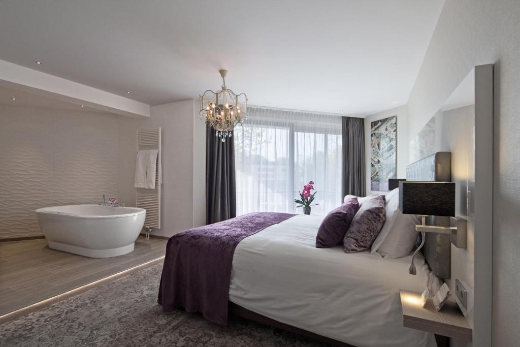 Postel nebo postele na pokoji v ubytování Van der Valk Hotel Leiden