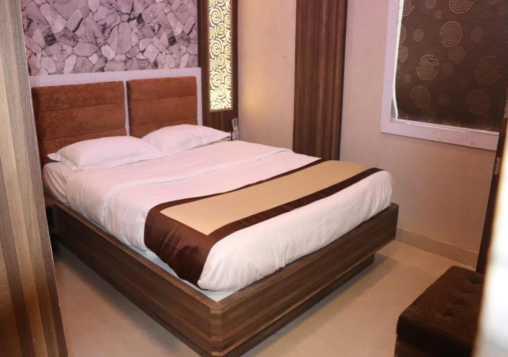 Postel nebo postele na pokoji v ubytování Hotel Angina