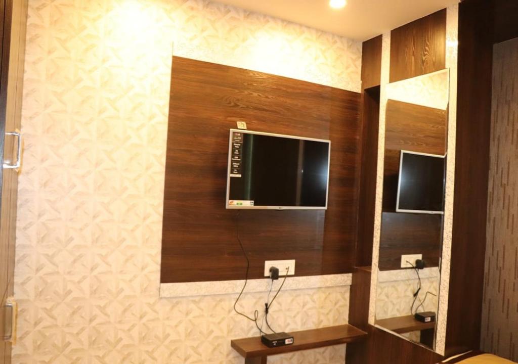 TV a/nebo společenská místnost v ubytování Hotel Angina