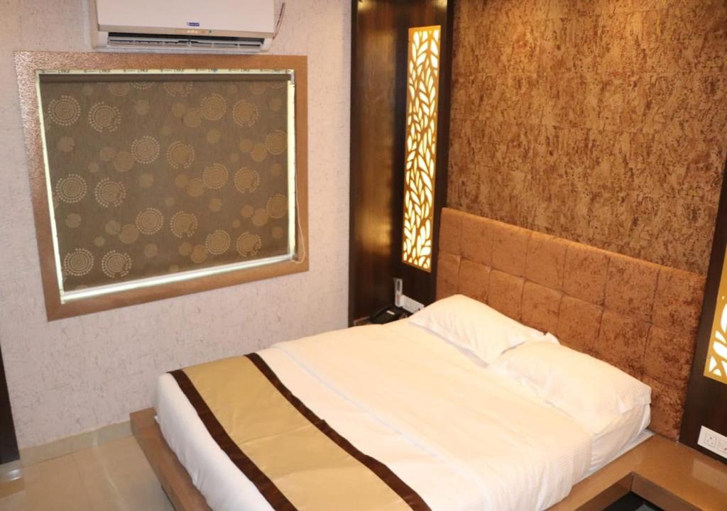 Postel nebo postele na pokoji v ubytování Hotel Angina