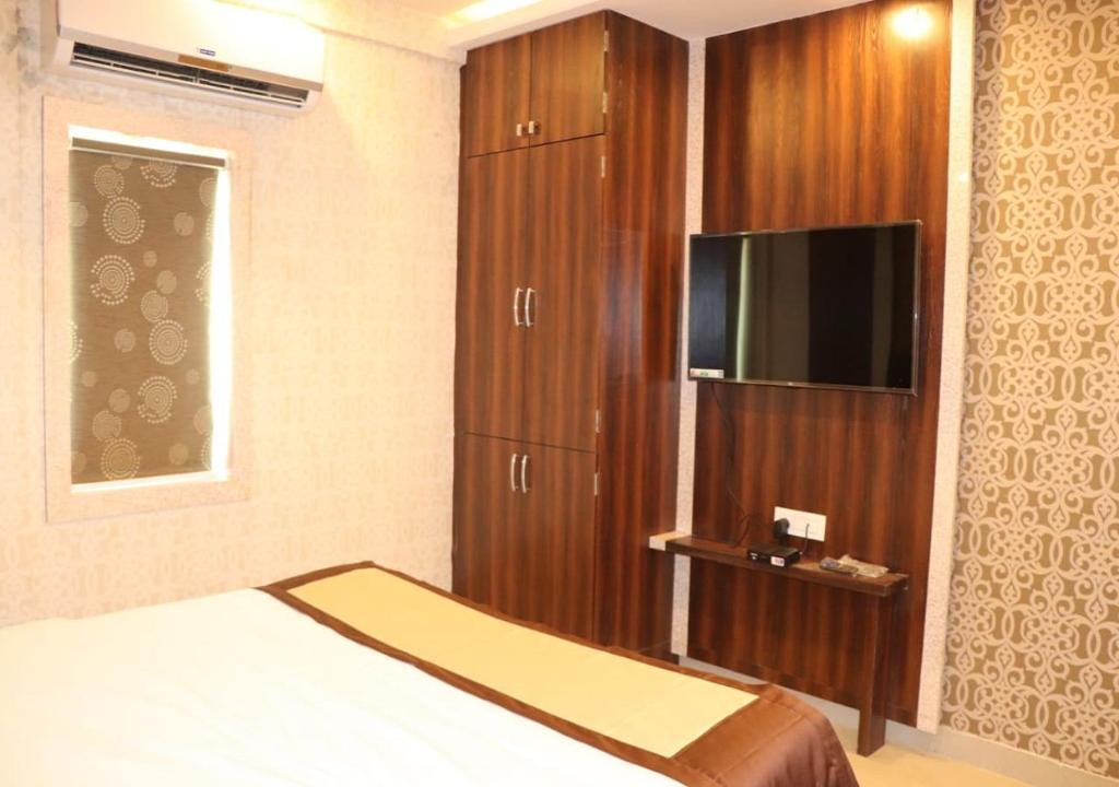 Postel nebo postele na pokoji v ubytování Hotel Angina
