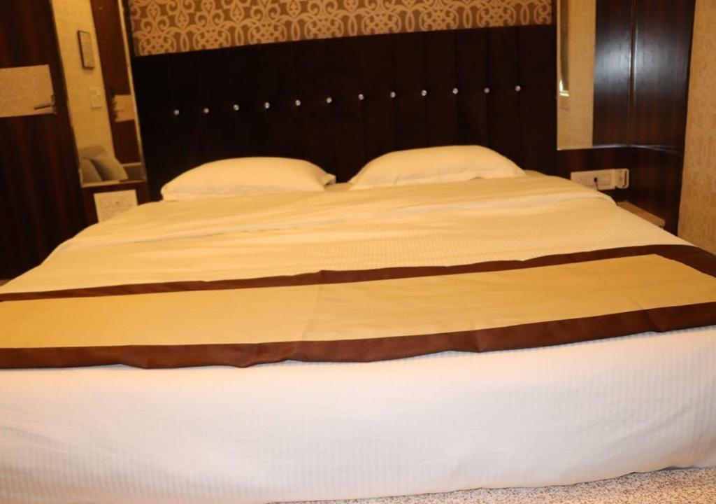 Postel nebo postele na pokoji v ubytování Hotel Angina
