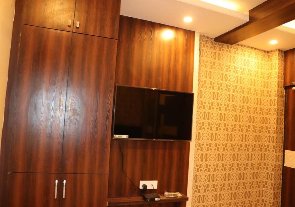 TV a/nebo společenská místnost v ubytování Hotel Angina