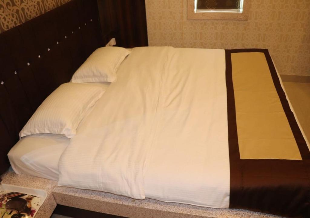 Postel nebo postele na pokoji v ubytování Hotel Angina