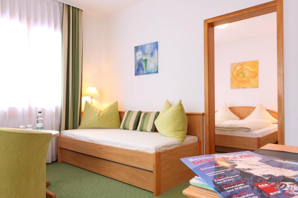 Voodi või voodid majutusasutuse Bernerhof Swiss Quality Hotel toas