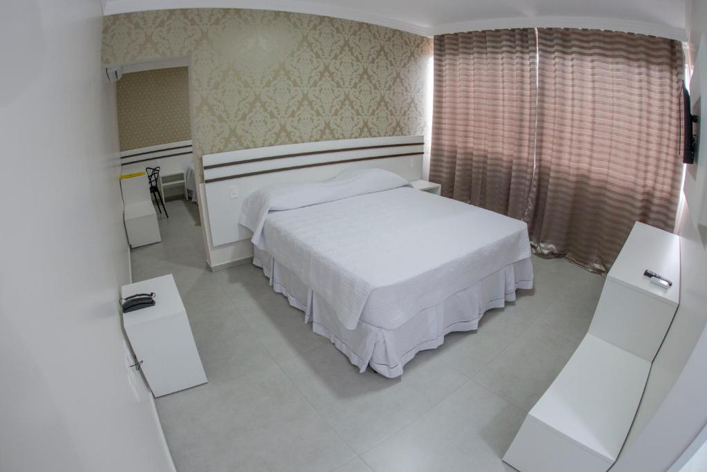 Postel nebo postele na pokoji v ubytování HOTEL HPR