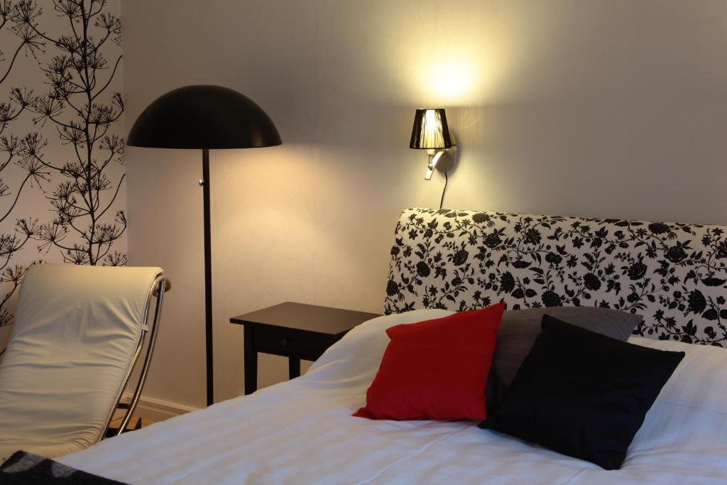 Postel nebo postele na pokoji v ubytování Borgs Villahotell och B&B
