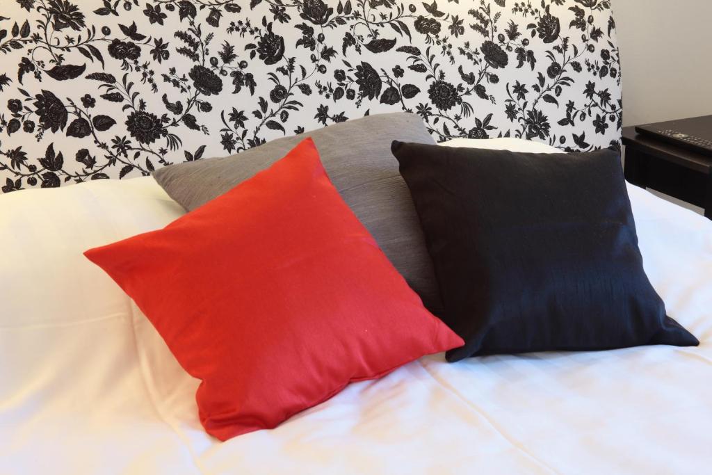 Postel nebo postele na pokoji v ubytování Borgs Villahotell och B&B