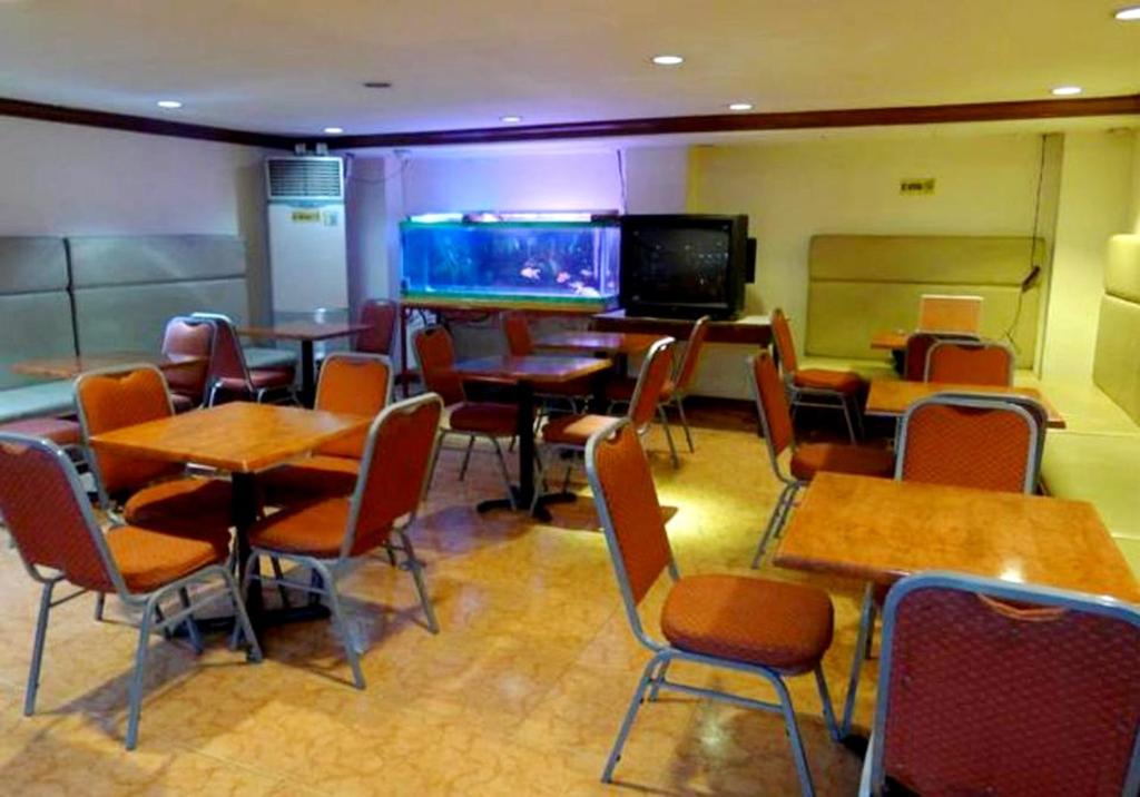 TV a/nebo společenská místnost v ubytování Cebuview Tourist Inn