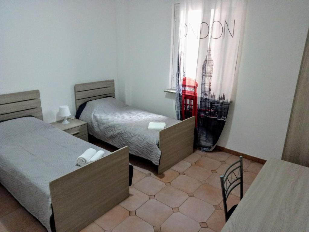 Postel nebo postele na pokoji v ubytování B&B MIke