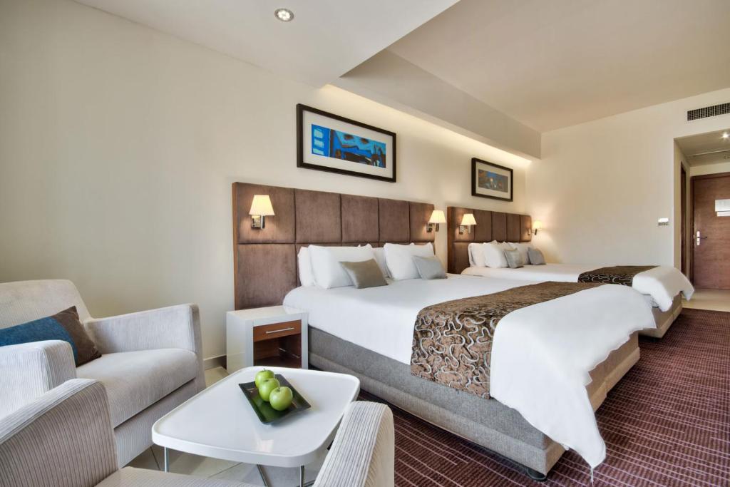 Postel nebo postele na pokoji v ubytování The George, Urban Boutique Hotel
